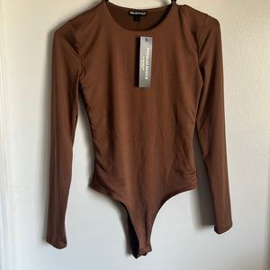 Never worn small size brown bodysuit by wearever with snap buttons